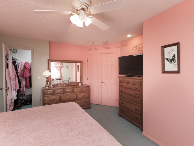 1280 20 Road Fruita, CO 81521 - Photo 31 of 41 a bed room with a bed and a flat screen tv