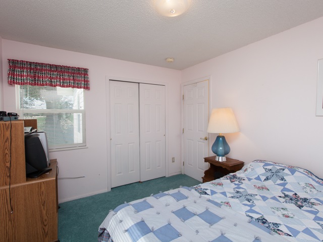1280 20 Road Fruita, CO 81521 - Photo 36 of 41 a bedroom with a bed and a window
