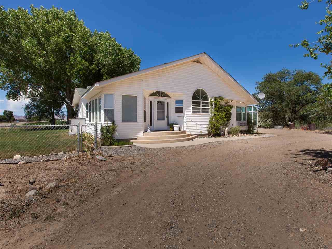 1280 20 Road Fruita, CO 81521 - Photo 37 of 41 a front view of a house with garden