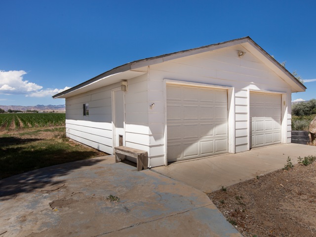 1280 20 Road Fruita, CO 81521 - Photo 4 of 41 a front view of a house with a yard