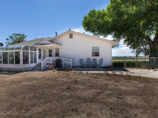 1280 20 Road Fruita, CO 81521 - Photo 6 of 41 a view of a house with a yard