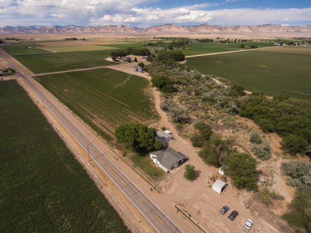 1280 20 Road Fruita, CO 81521 - Photo 7 of 41 a view of a lake with a mountain