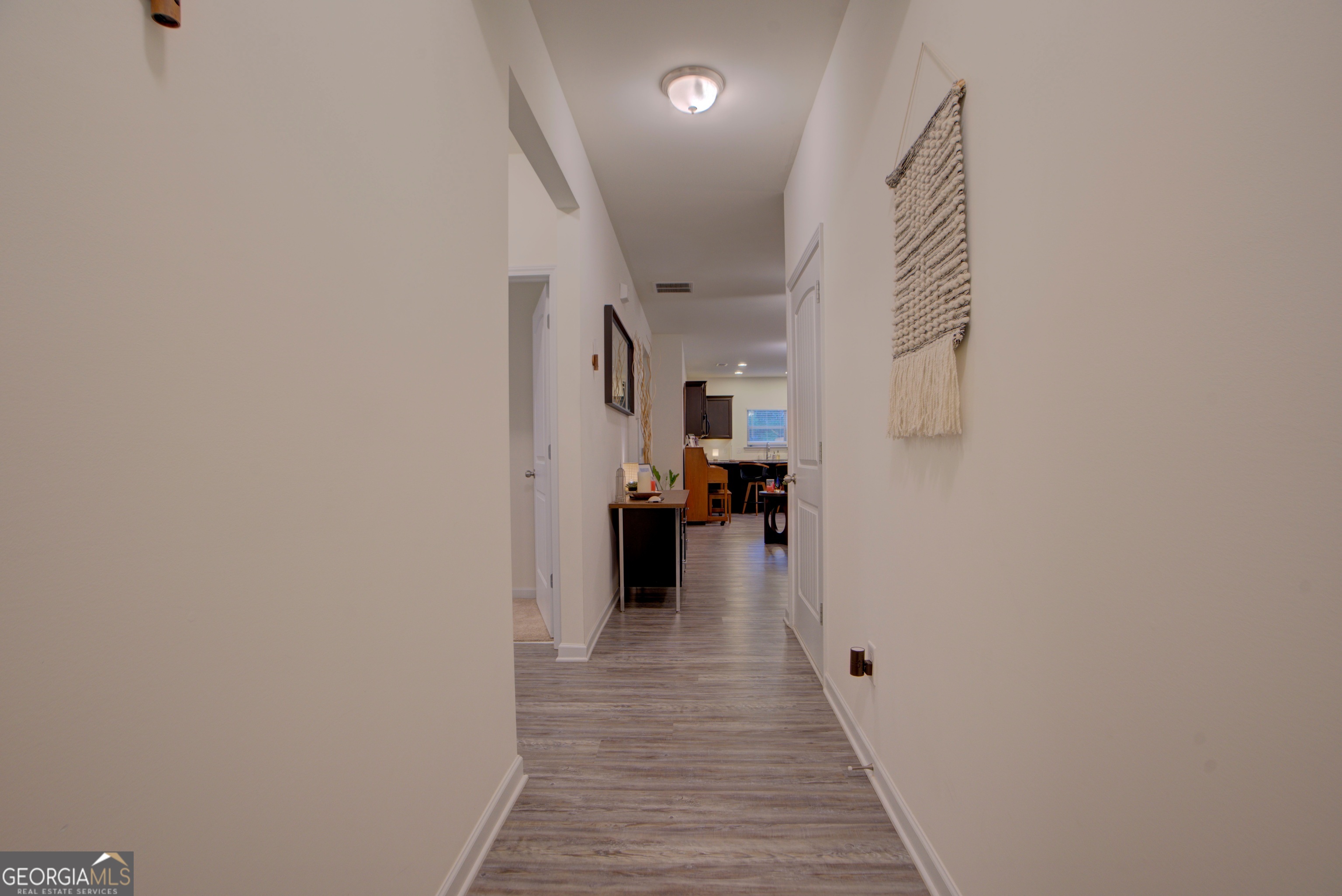 67 Willowrun Drive Rome, GA 30165 - Photo 2 of 24 a view of a hallway with a kitchen