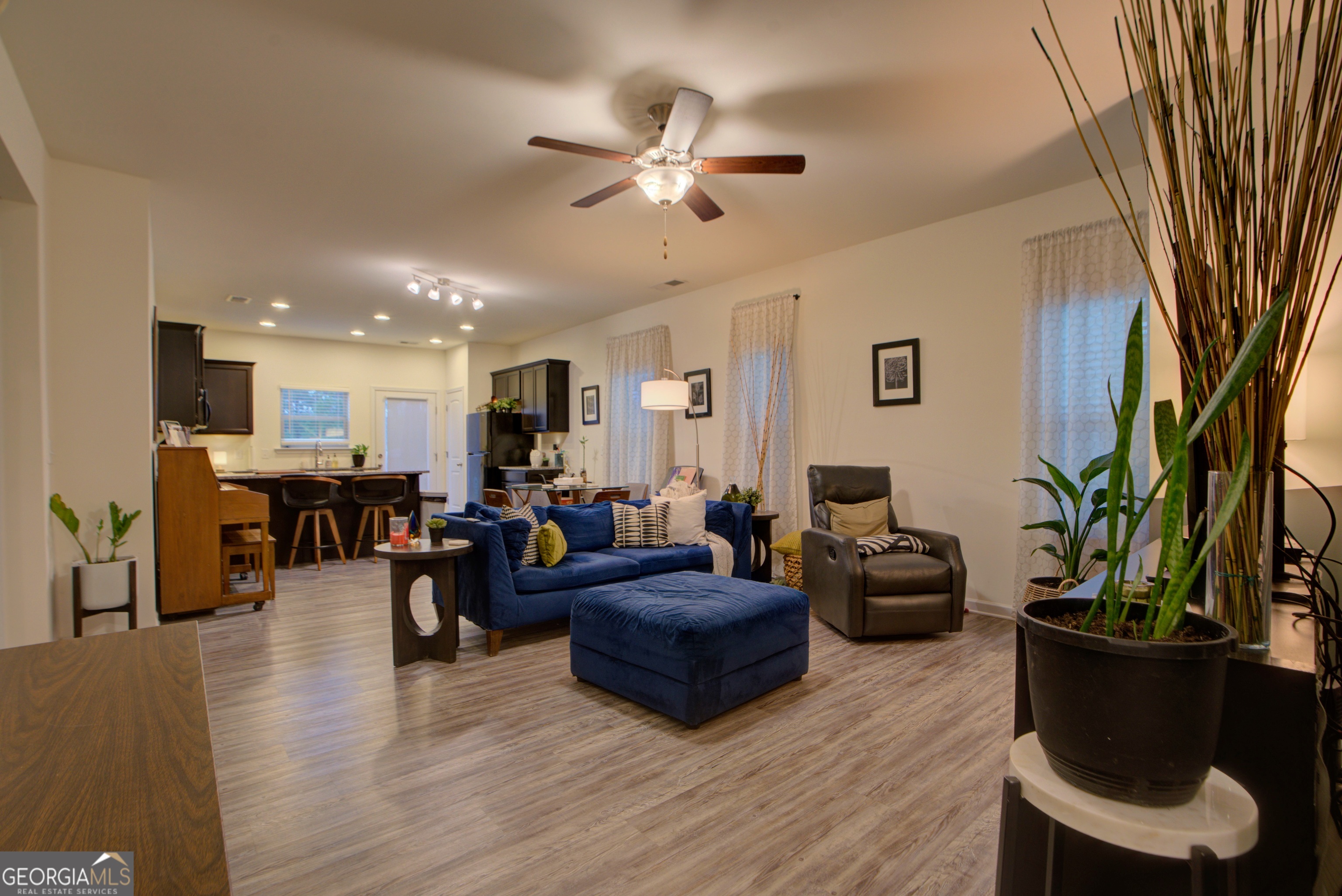 67 Willowrun Drive Rome, GA 30165 - Photo 3 of 24 a living room with furniture kitchen view and a potted plant