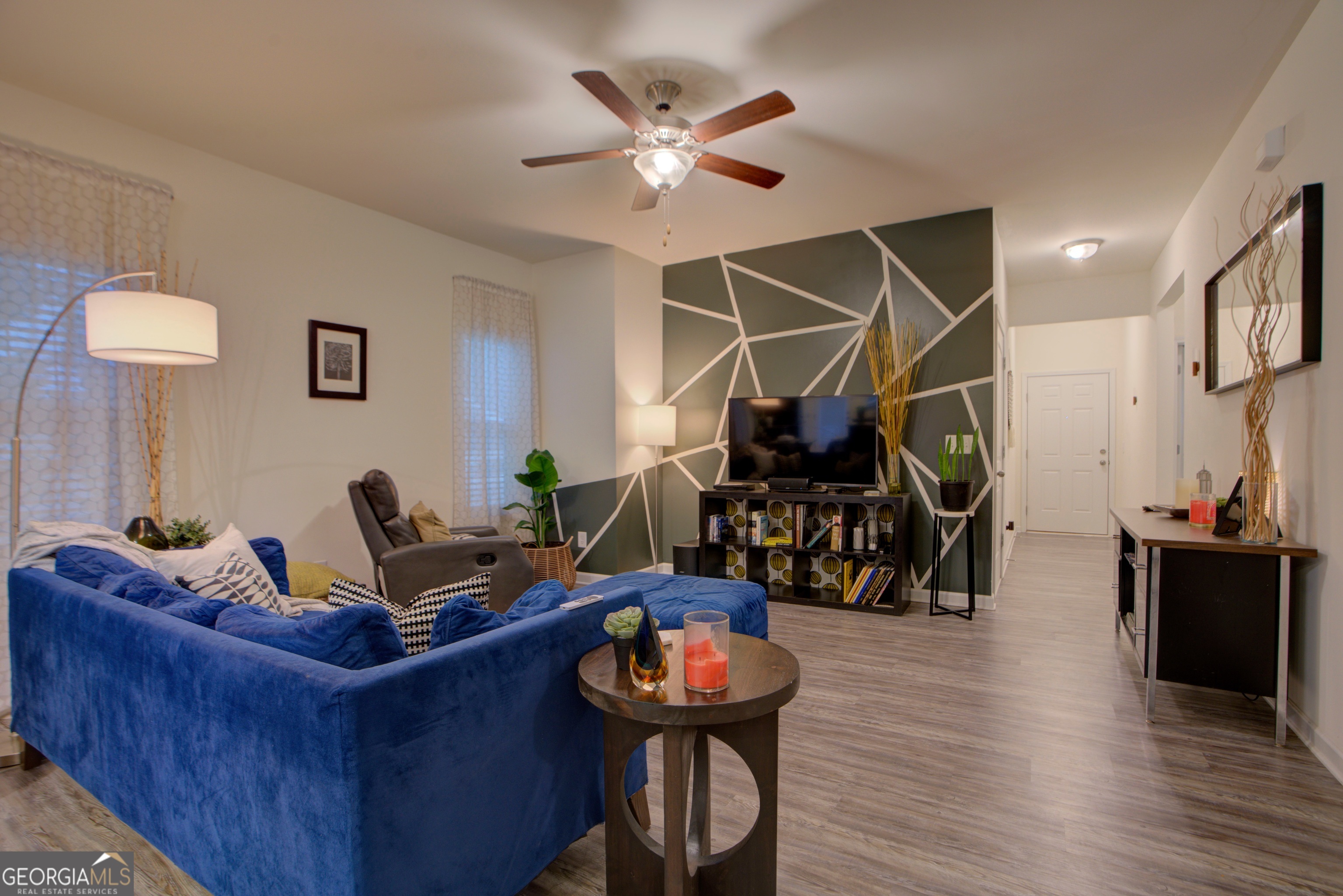 67 Willowrun Drive Rome, GA 30165 - Photo 4 of 24 a work room with furniture and wooden floor
