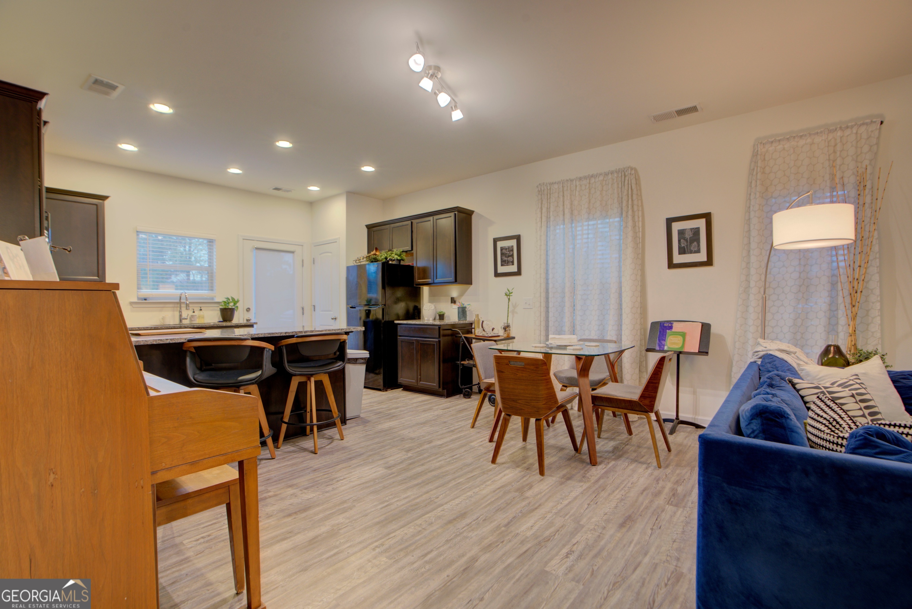 67 Willowrun Drive Rome, GA 30165 - Photo 5 of 24 a view of a dining room with furniture and wooden floor