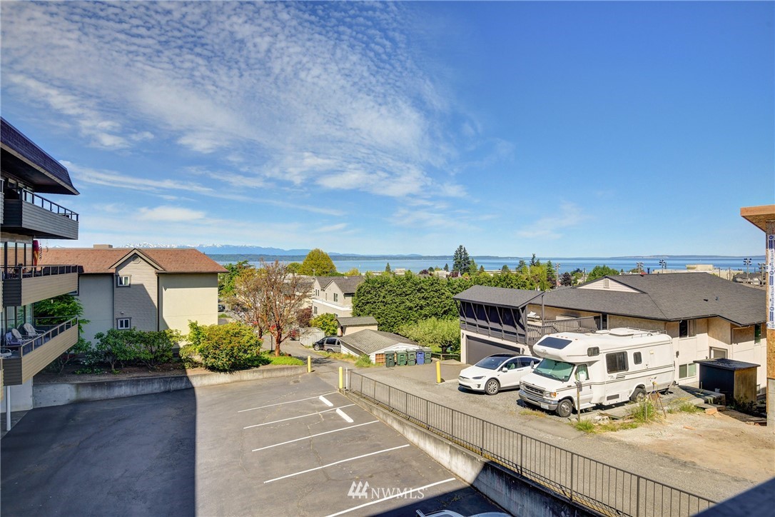 655 Main Street, Unit 204 Edmonds, WA 98020 - Photo 3 of 21 an aerial view of residential houses with outdoor space