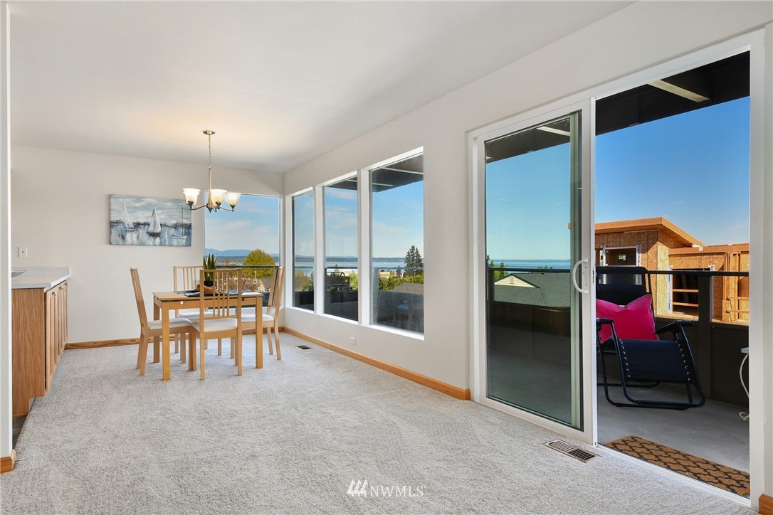 655 Main Street, Unit 204 Edmonds, WA 98020 - Photo 10 of 21 a view of a livingroom with furniture and window