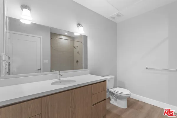 a bathroom with a bathtub and a sink