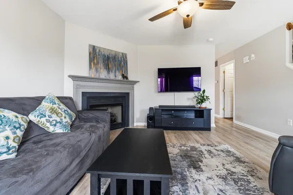 a living room with furniture and a window