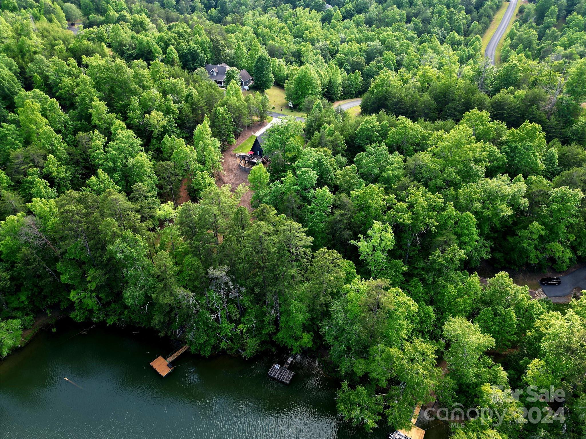 Tbd Tbd Parkway Rd Mill Spring Mill Spring, NC 28756 - Photo 8 of 36 an aerial view of residential house with outdoor space and trees all around