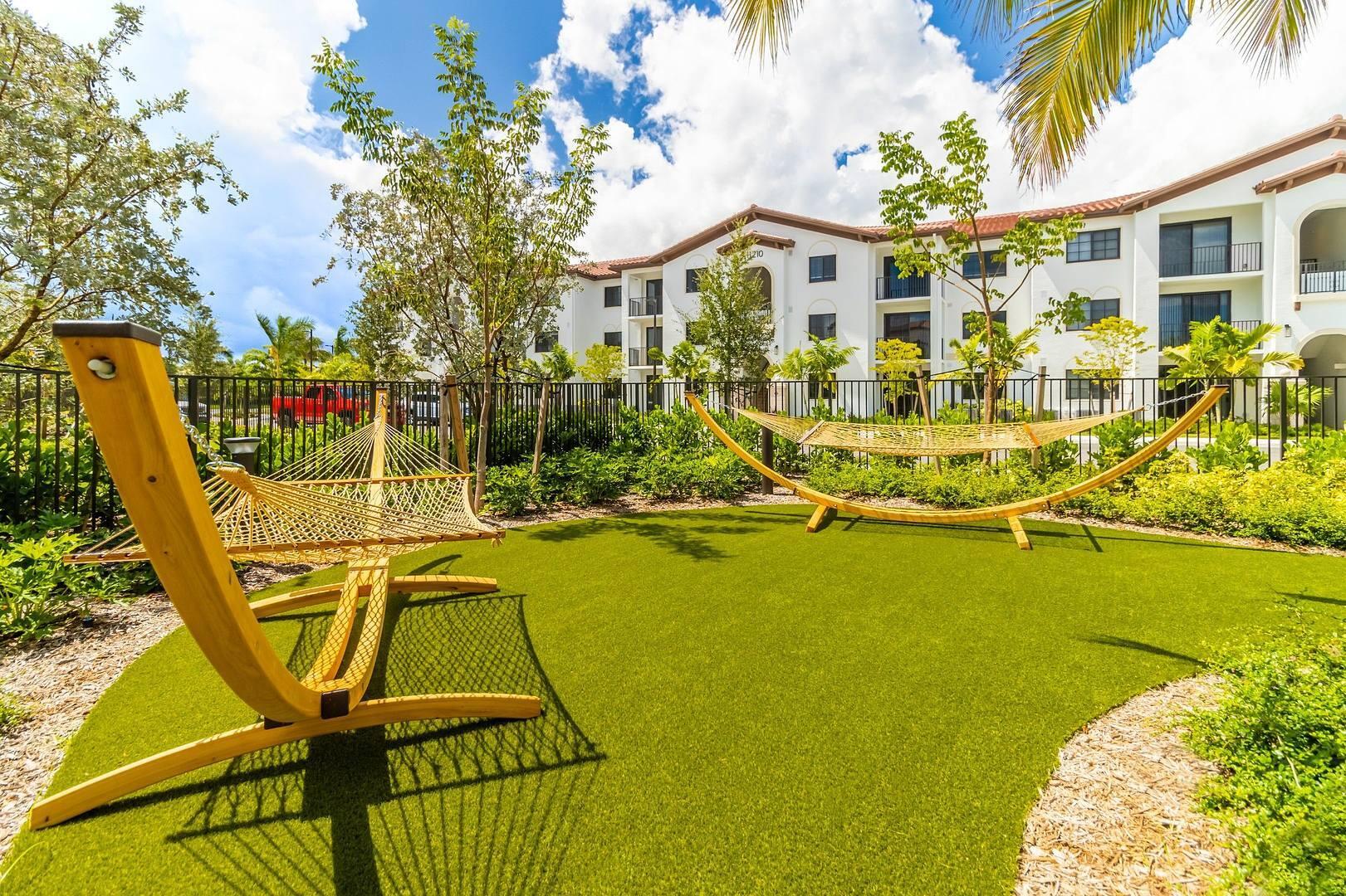11290 Channing Way, Unit 102 Royal Palm Beach, FL 33414 - Photo 18 of 24 a view of a house with swimming pool
