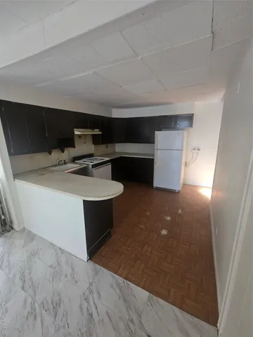 a room with table and chairs