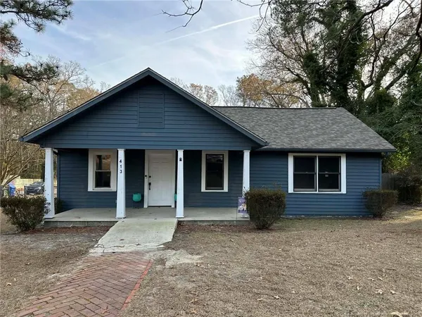 a front view of a house with a garage