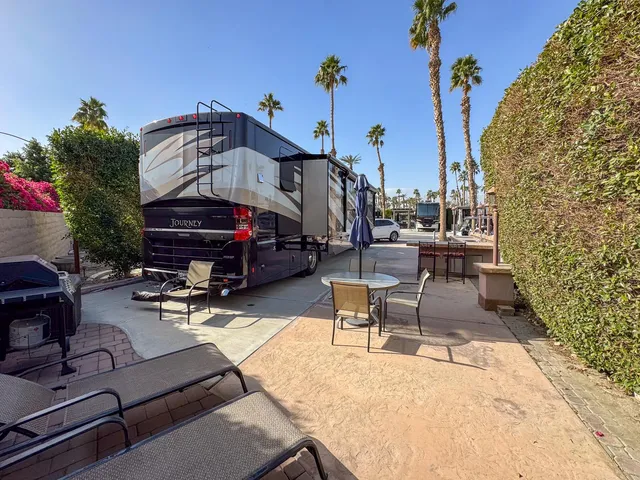 a view of a terrace with sitting area