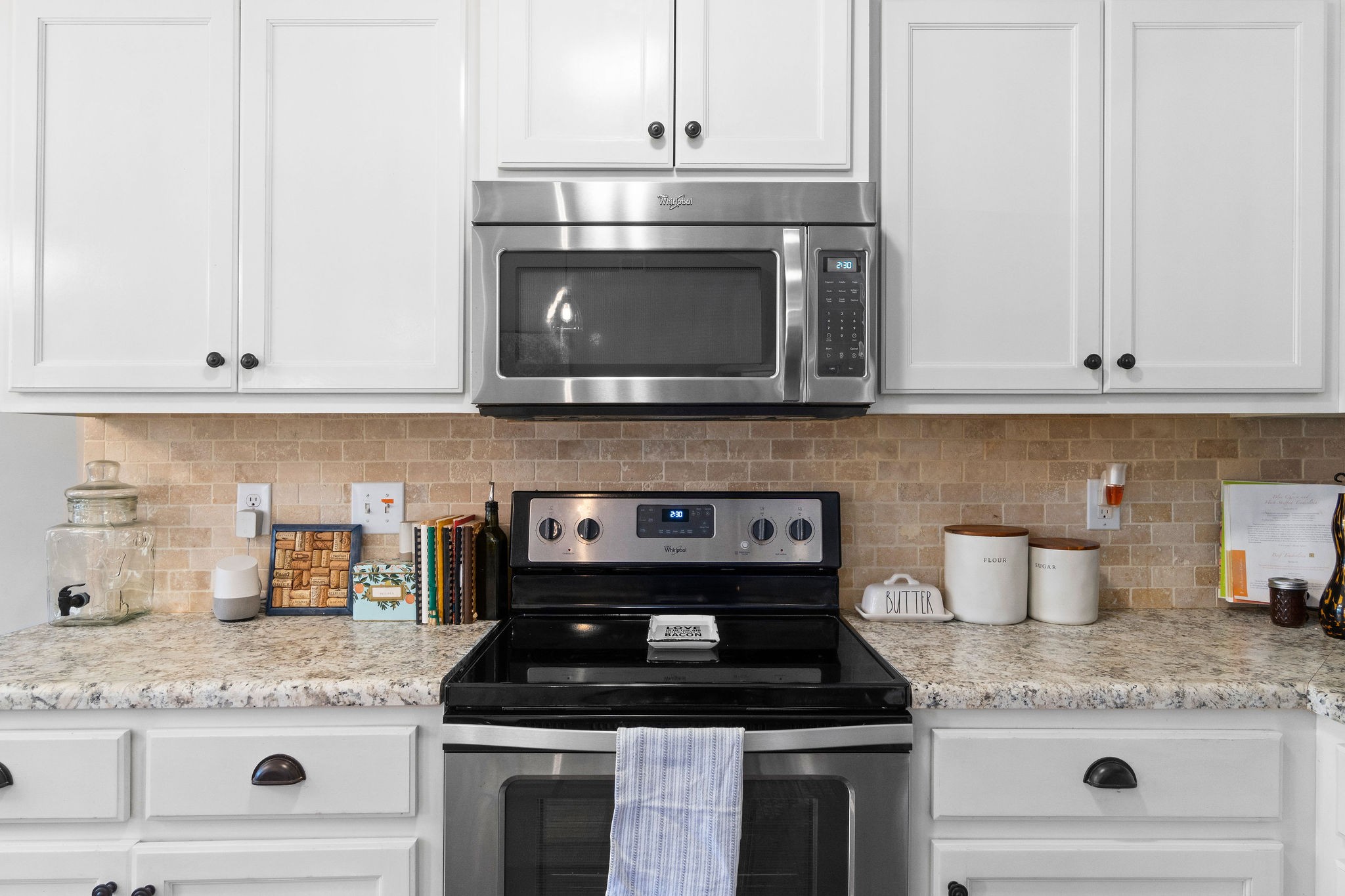 2344 River Road Clarksville, TN 37040 - Photo 21 of 37 a kitchen with granite countertop white cabinets and stainless steel appliances