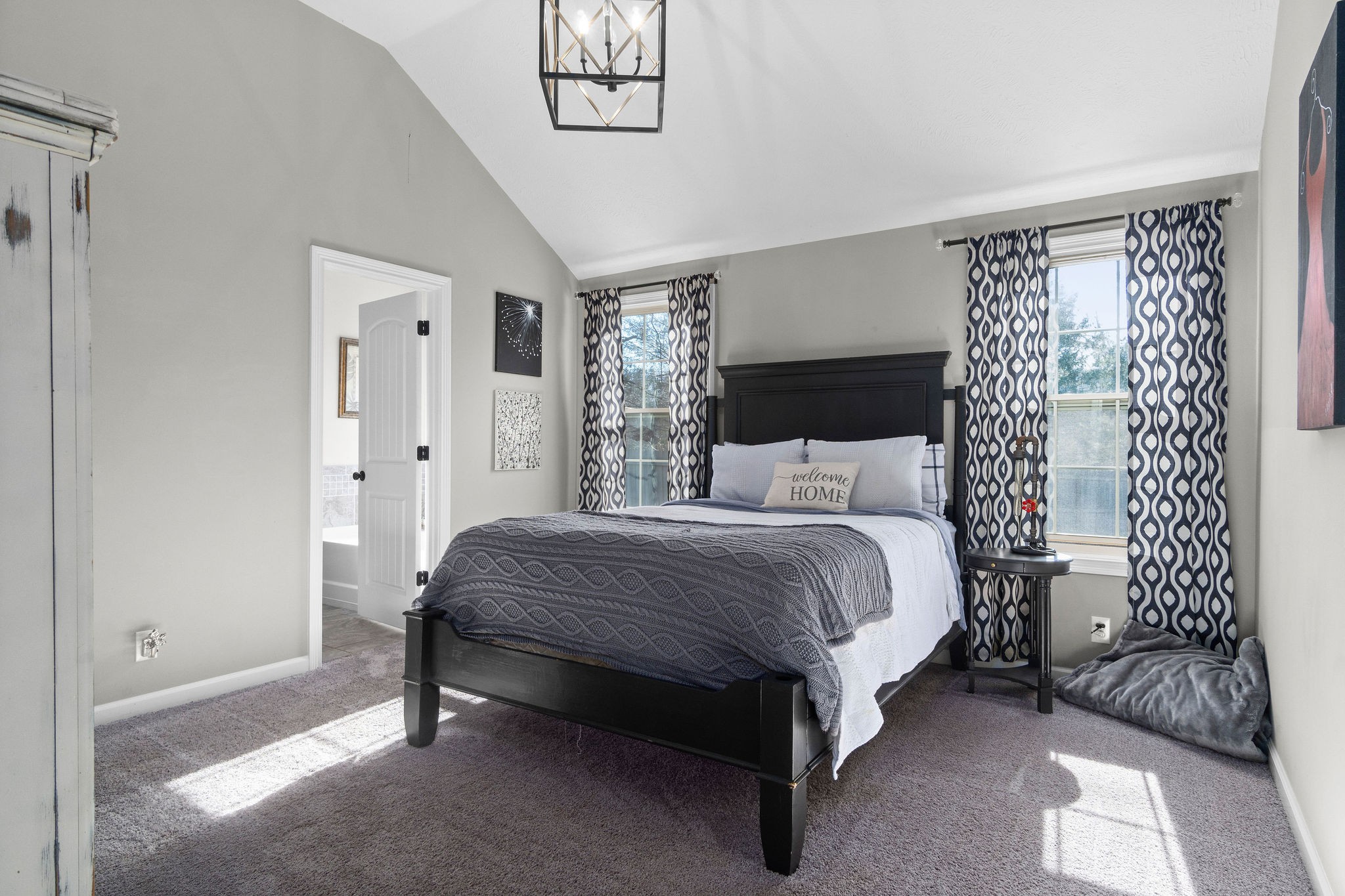 2344 River Road Clarksville, TN 37040 - Photo 24 of 37 a spacious bedroom with a bed and a chair