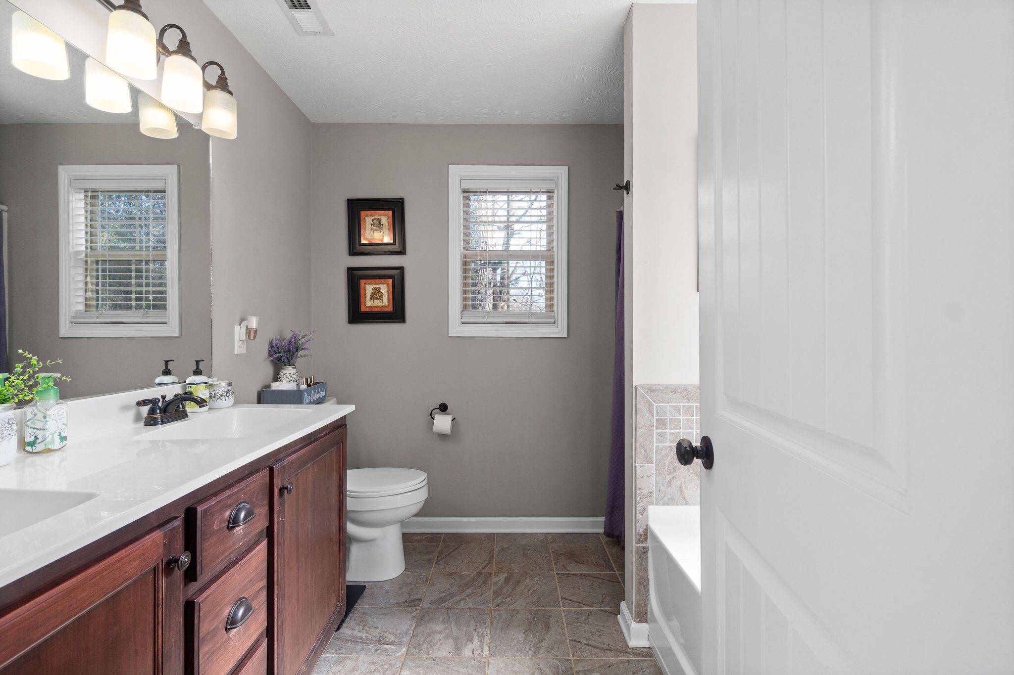 2344 River Road Clarksville, TN 37040 - Photo 26 of 37 a bathroom with a sink a toilet and shower