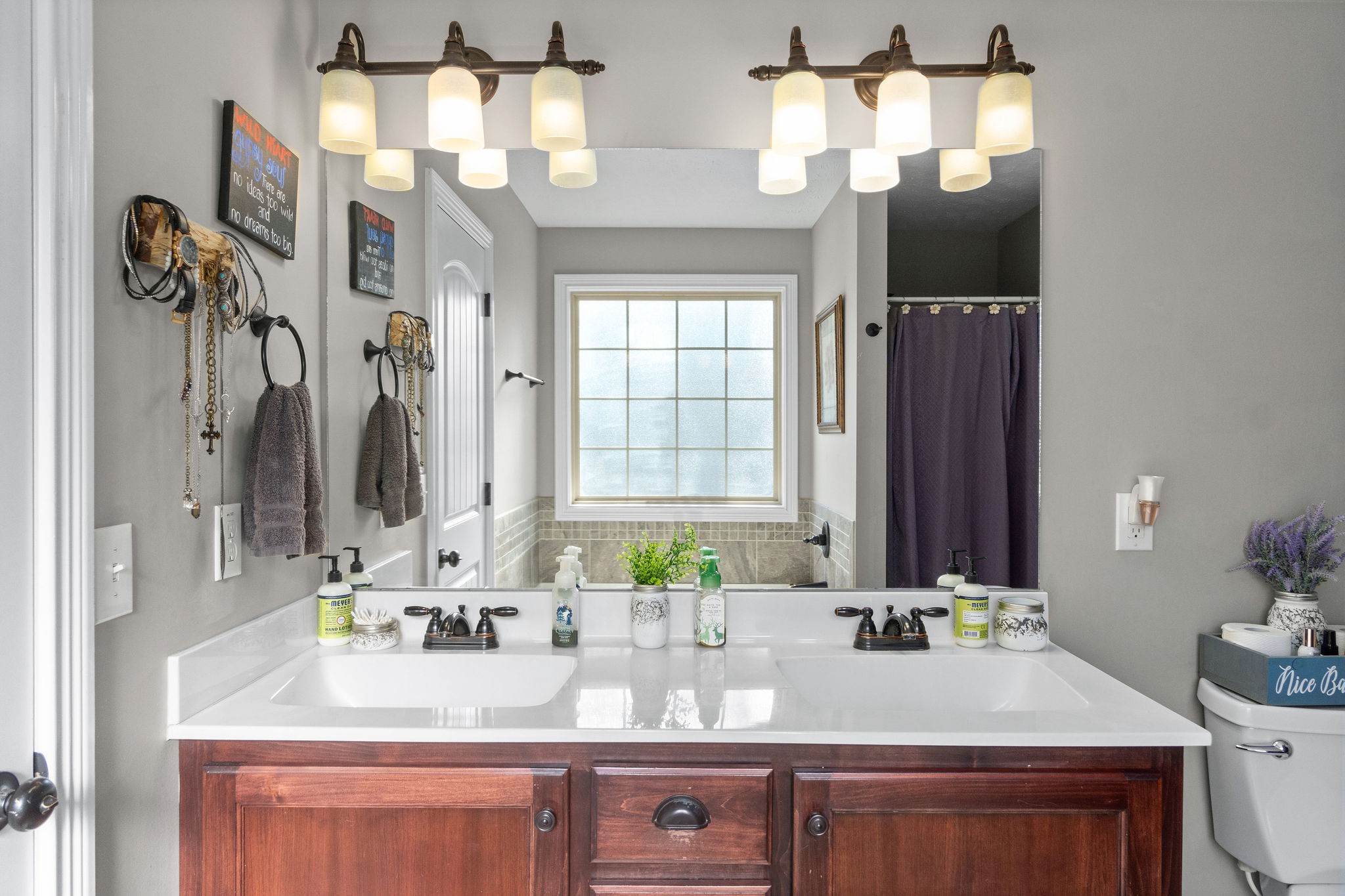 2344 River Road Clarksville, TN 37040 - Photo 27 of 37 a bathroom with a sink vanity and a mirror