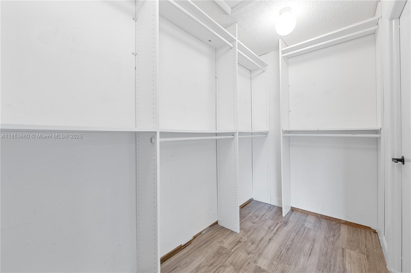 4088 Inverrary Drive, Unit 11F Lauderhill, FL 33319 - Photo 23 of 34 a view of an empty walk in closet