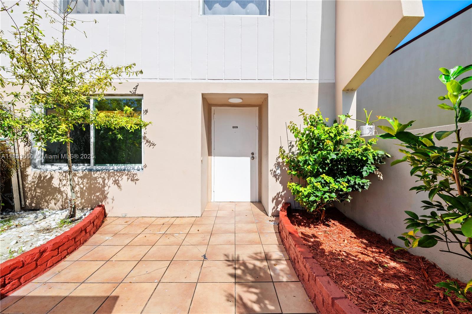 4088 Inverrary Drive, Unit 11F Lauderhill, FL 33319 - Photo 5 of 34 a entryway view with a potted plant