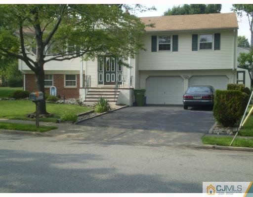 14 Library Place Edison, NJ 08820 - Photo 1 of 8 a house view with a garden space