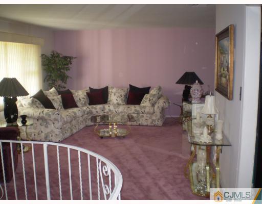 14 Library Place Edison, NJ 08820 - Photo 2 of 8 a living room with furniture