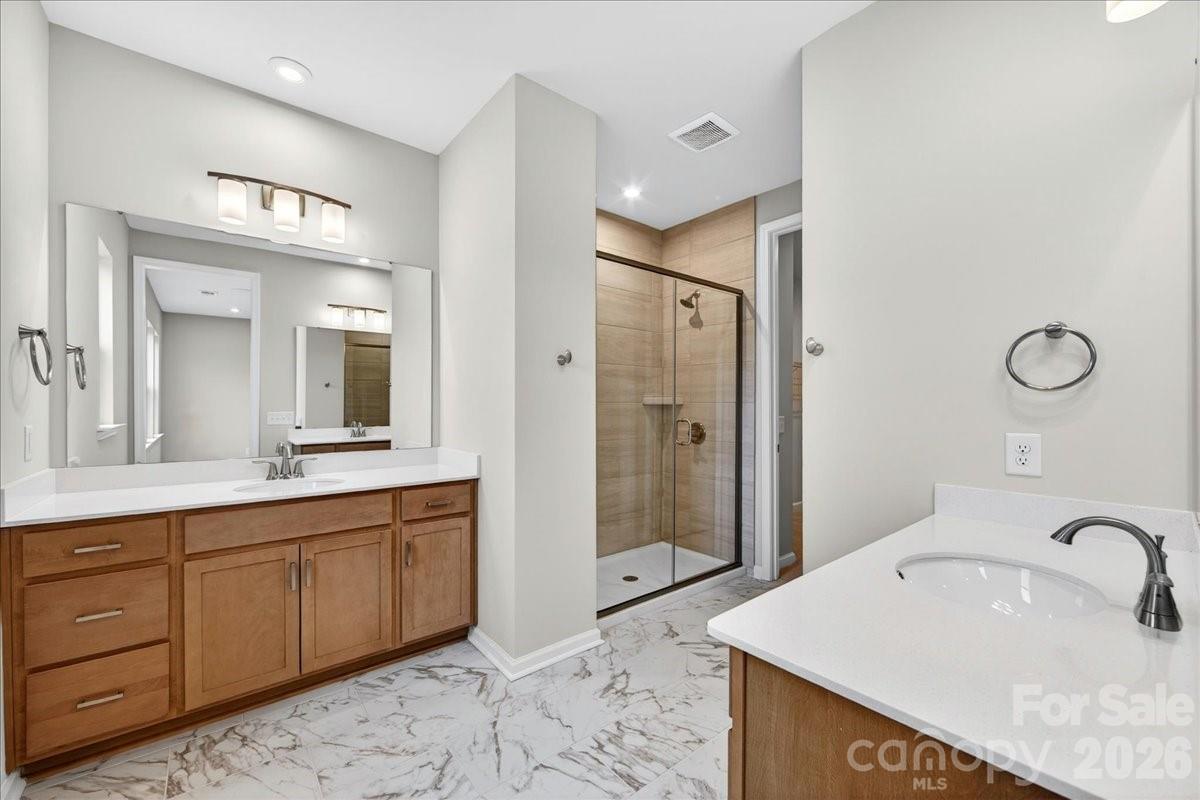 512 Webster Lane Cramerton, NC 28032 - Photo 19 of 28 a bathroom with a sink and a mirror