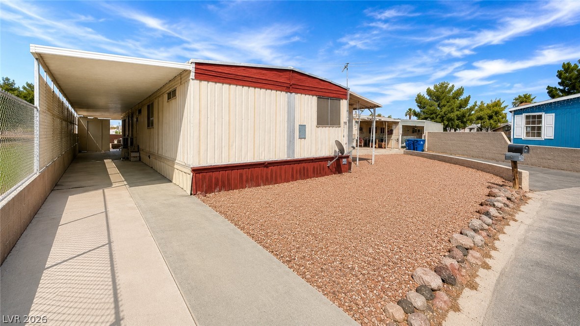 2764 Rainer Court Las Vegas, NV 89142 - Photo 10 of 13 A manufactured home in a quaint Cul-de-sac and Golf Course views featuring ample covered parking and a low-maintenance gravel yard already done, or, customize this large space yourself.