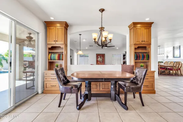 a view of a livingroom with furniture and dining table