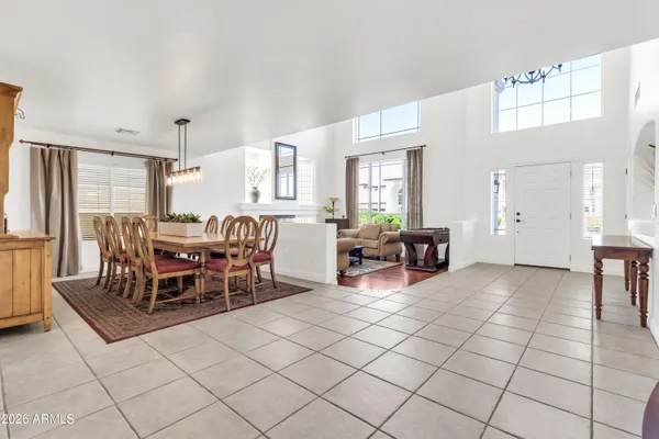 a open kitchen with stainless steel appliances kitchen island granite countertop a sink and cabinets