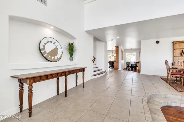 a bathroom with a sink a double vanity and a mirror