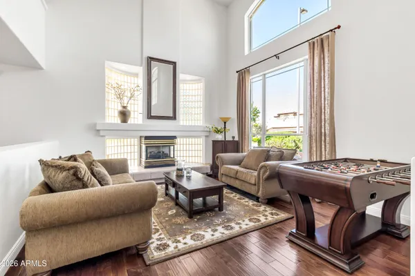 a view of walk in closet with clothes