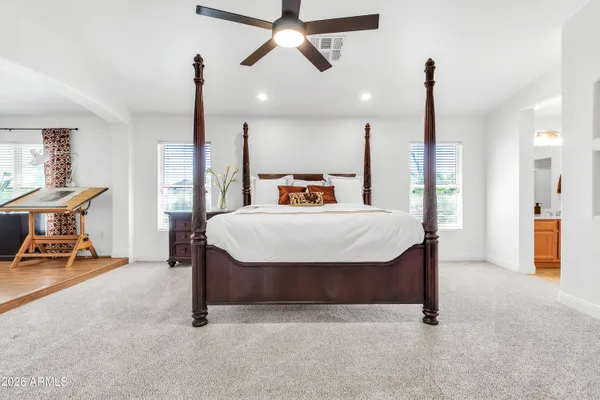 a bathroom with a bathtub and shower curtain