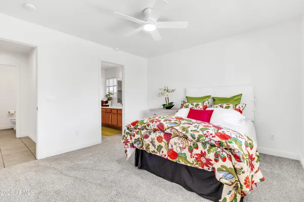 a view of a house with sitting area and garden