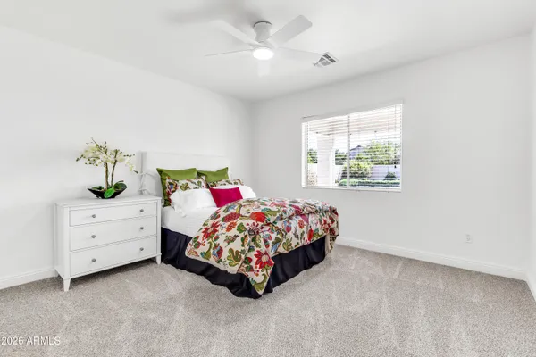 a view of a backyard with a sitting area and furniture