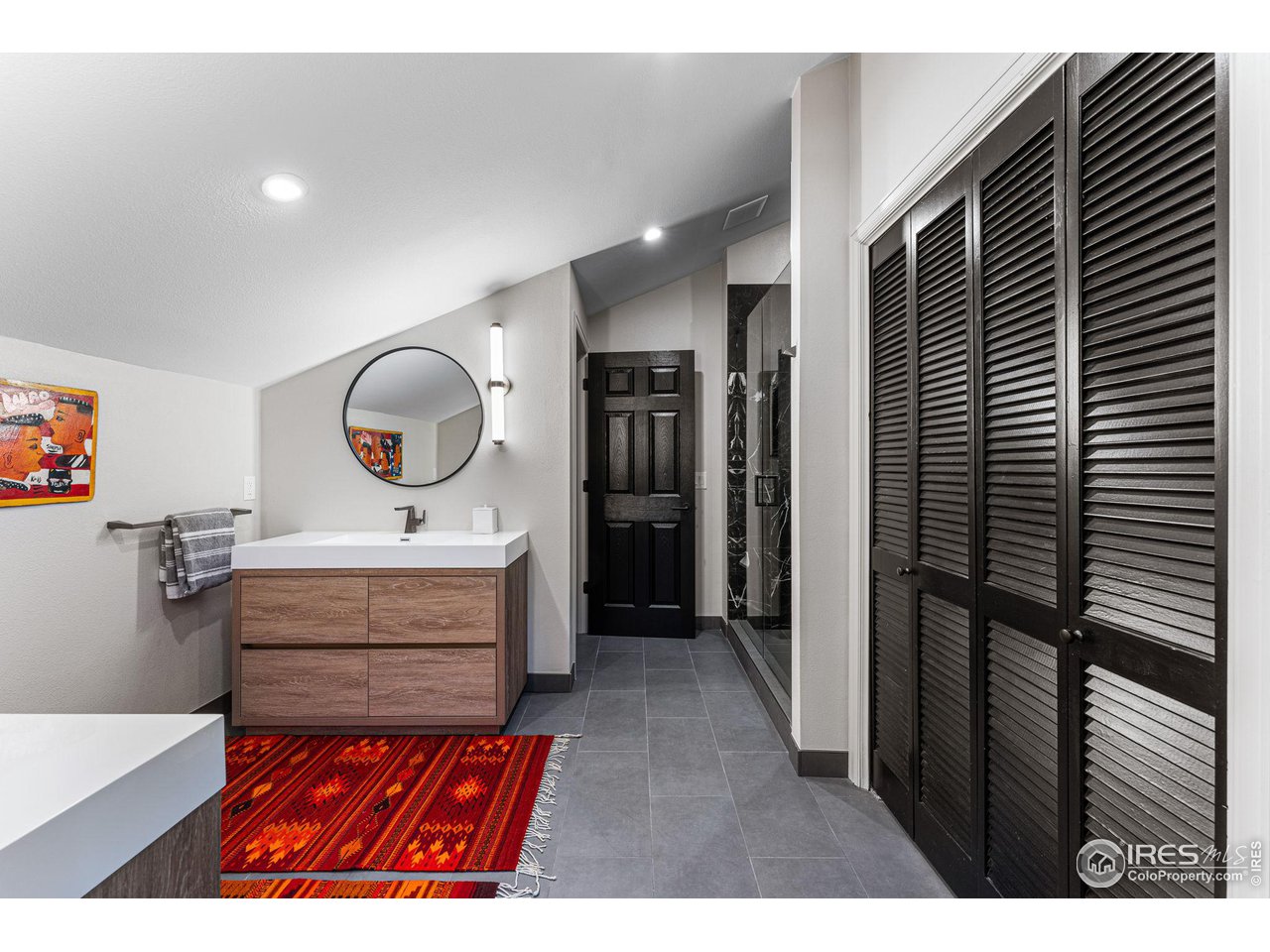 4475 Laguna Place, Unit 309 Boulder, CO 80303 - Photo 17 of 38 Upstairs master bathroom marble shower