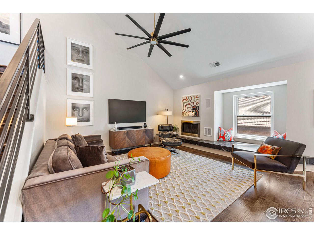 4475 Laguna Place, Unit 309 Boulder, CO 80303 - Photo 2 of 38 Living Room with wood burning fireplace