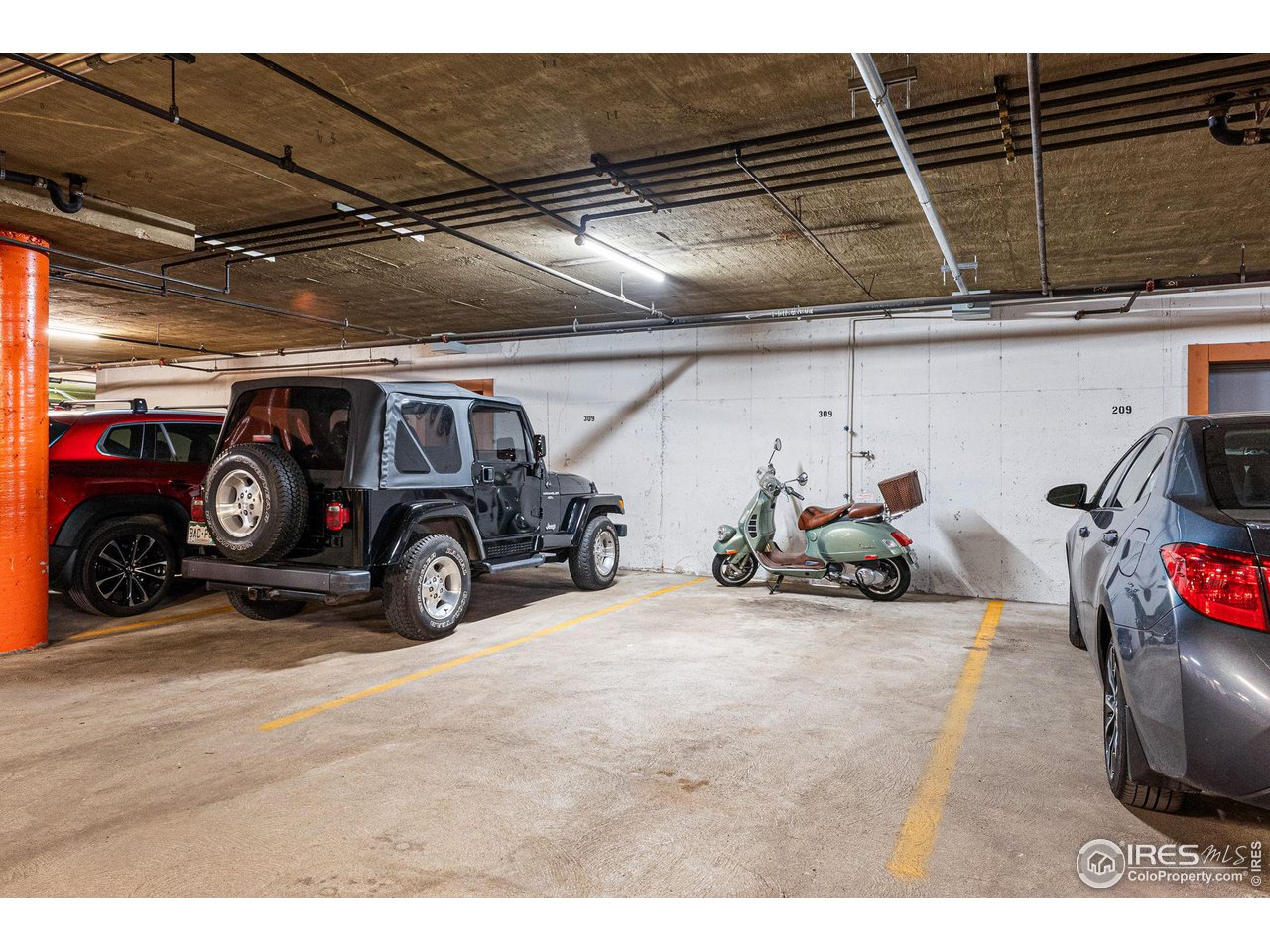 4475 Laguna Place, Unit 309 Boulder, CO 80303 - Photo 28 of 38 Two reserved underground parking spots with a convenient elevator next to the unit