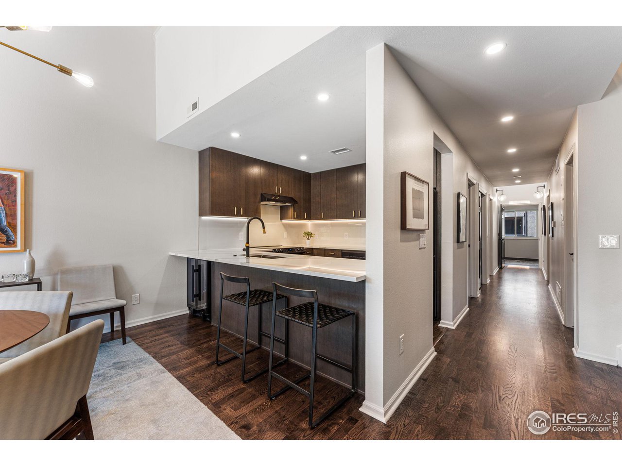 4475 Laguna Place, Unit 309 Boulder, CO 80303 - Photo 9 of 38 Hall leads to 2 bedrooms on the main level