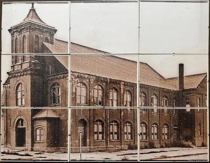 a view of a building with a street