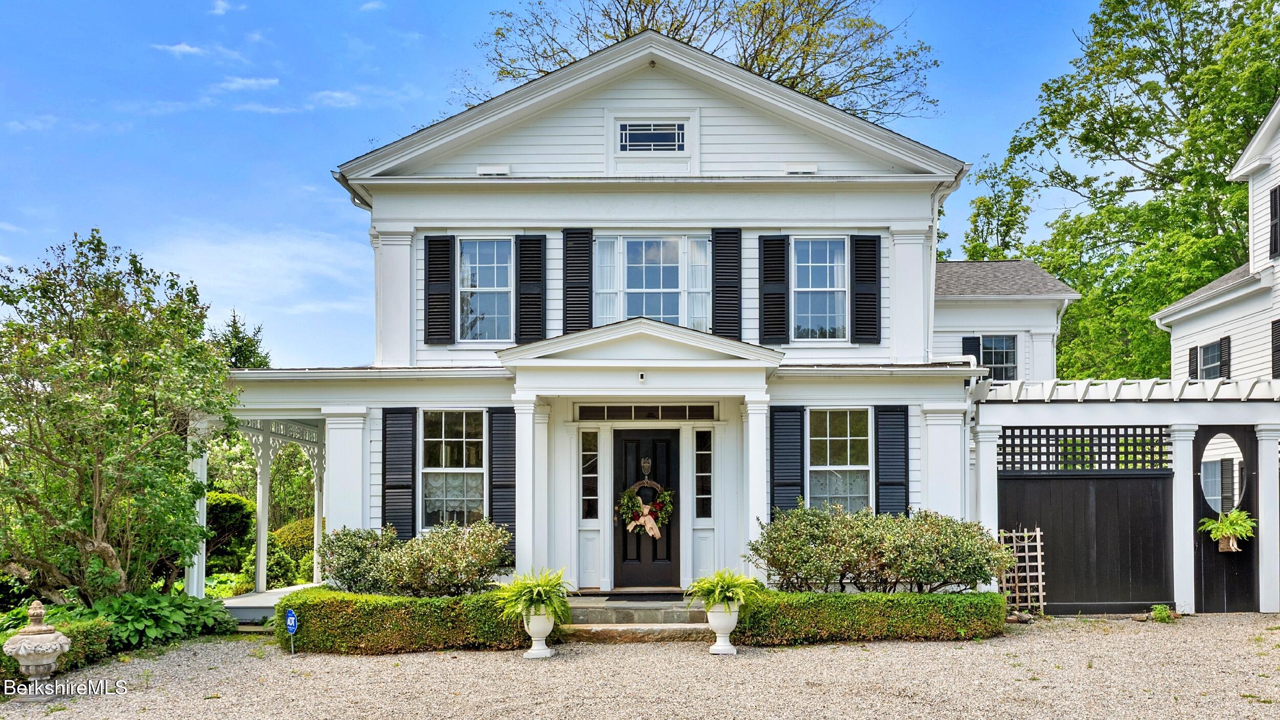 2650 Swamp Road Richmond, MA 01254 - Photo 4 of 49 a front view of a house with a yard