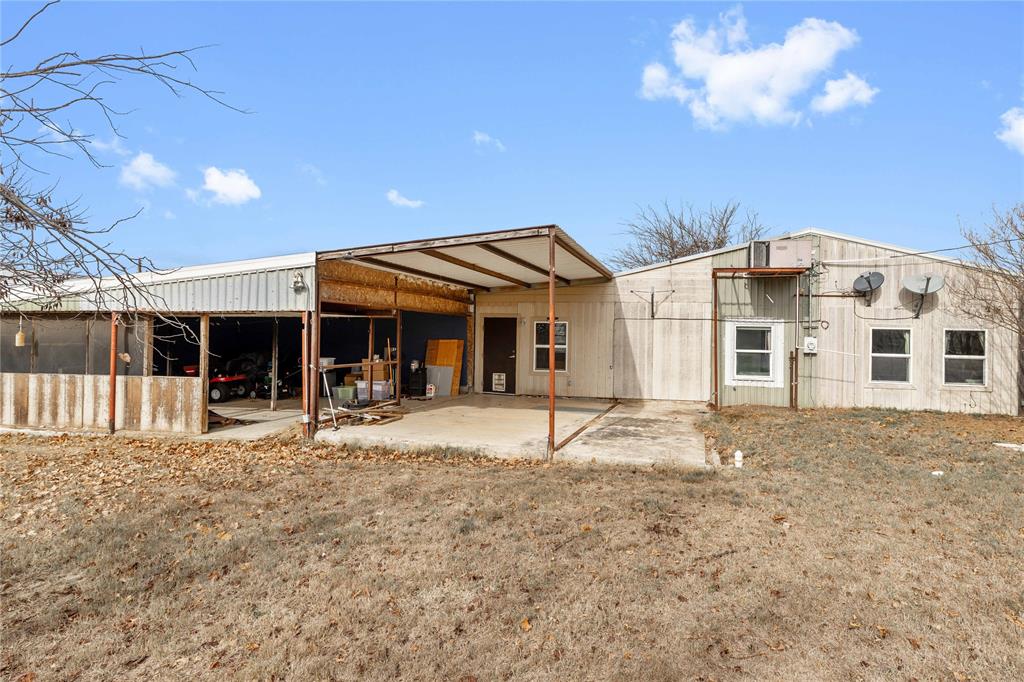 309 Goodwin Street Bangs, TX 76823 - Photo 19 of 20 View of front of home with a patio area