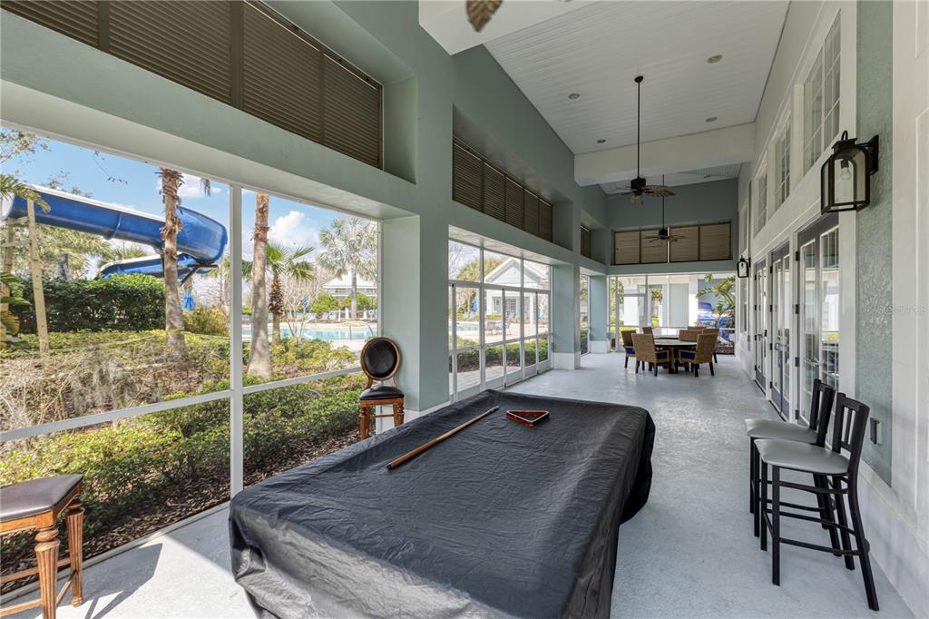 506 Rainbow Springs Loop Groveland, FL 34736 - Photo 25 of 30 a living room with patio