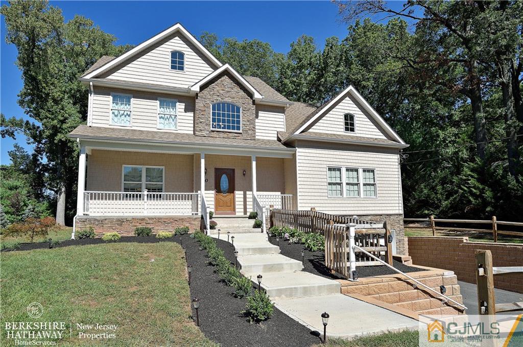 40 Edgewood Road Edison, NJ 08820 - Photo 1 of 25 a front view of a house with garden