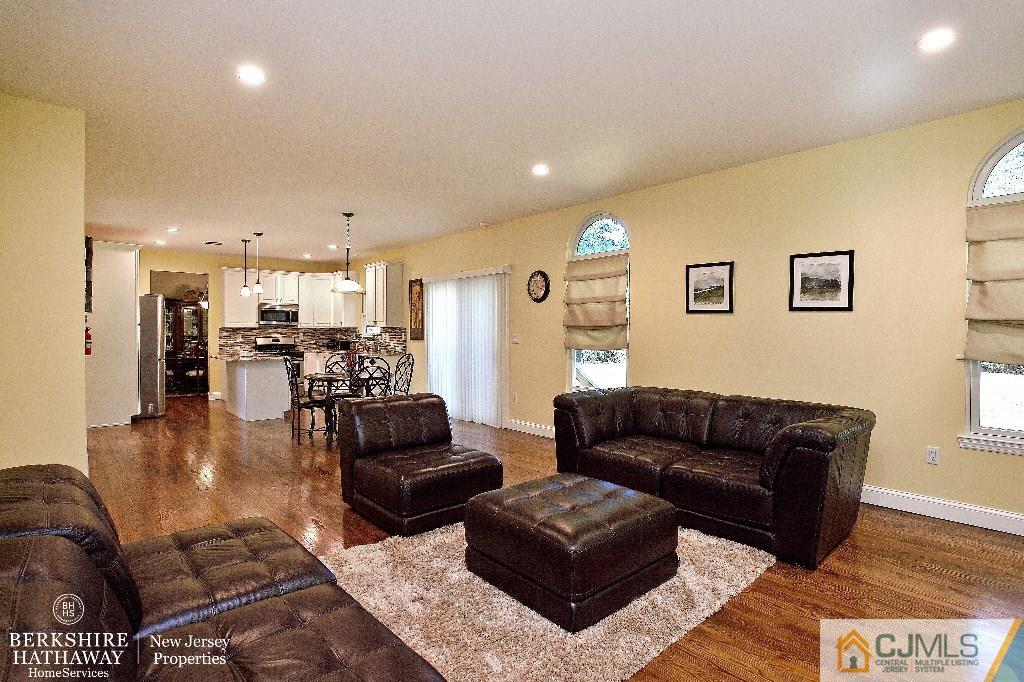 40 Edgewood Road Edison, NJ 08820 - Photo 12 of 25 a living room with furniture and a view of kitchen