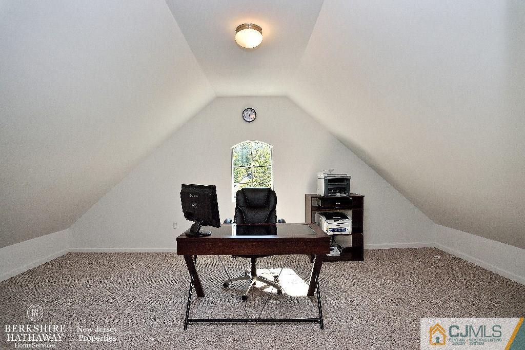 40 Edgewood Road Edison, NJ 08820 - Photo 20 of 25 a living room with furniture and a rug