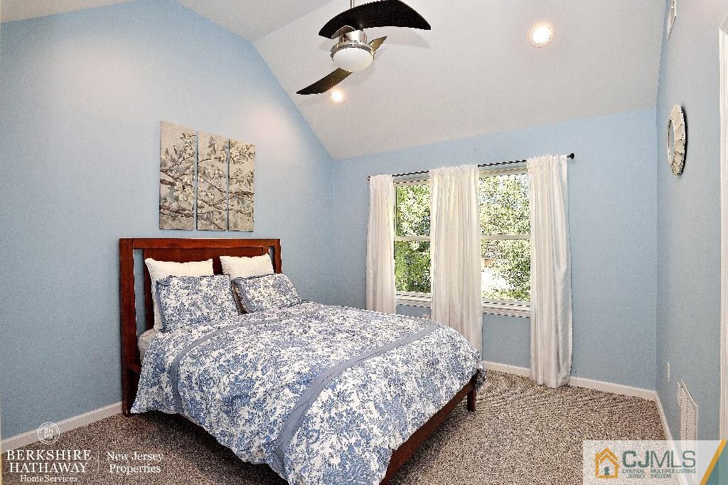 40 Edgewood Road Edison, NJ 08820 - Photo 21 of 25 a bedroom with a bed and a large window