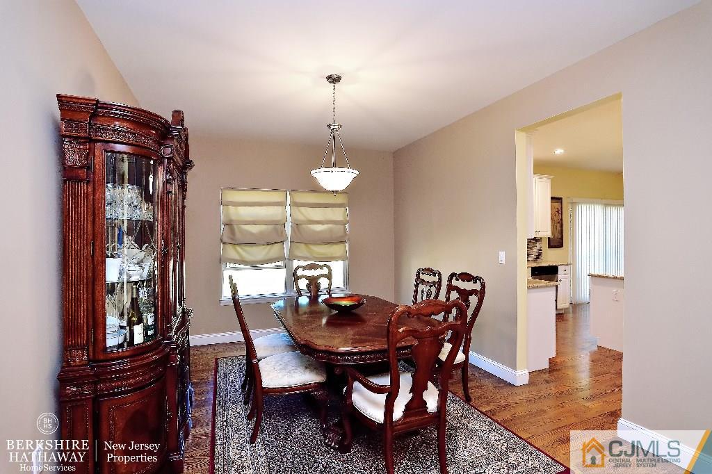 40 Edgewood Road Edison, NJ 08820 - Photo 6 of 25 a view of a dining room with furniture and chandelier