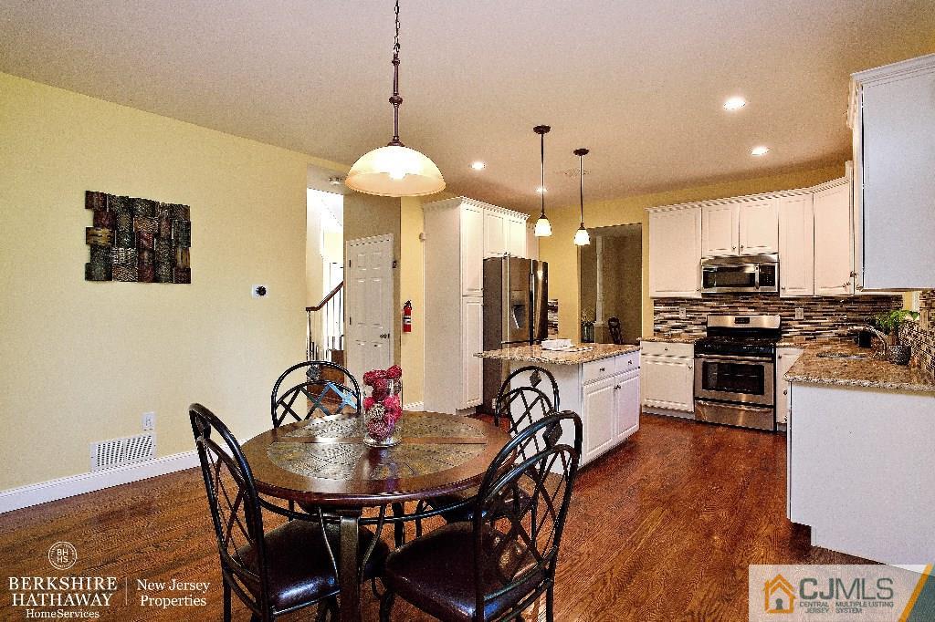 40 Edgewood Road Edison, NJ 08820 - Photo 10 of 25 a view of a dining room with furniture window and wooden floor